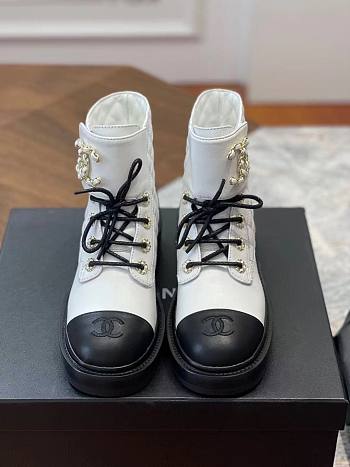 Chanel white CC boots