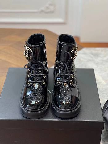 Chanel black patent CC boots